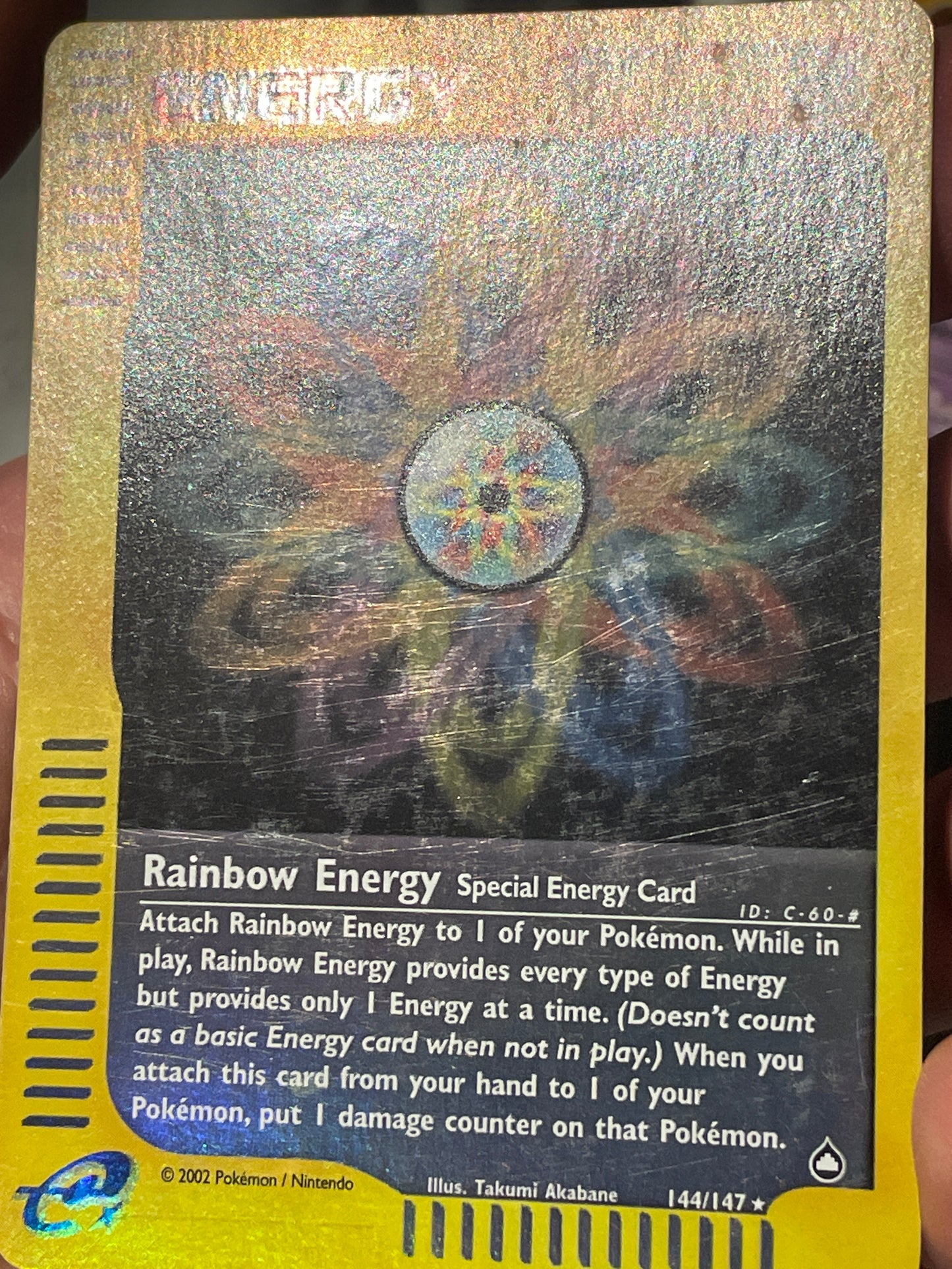 2003 Pokemon e-Series Aquapolis 144/147 Rainbow Energy Reverse